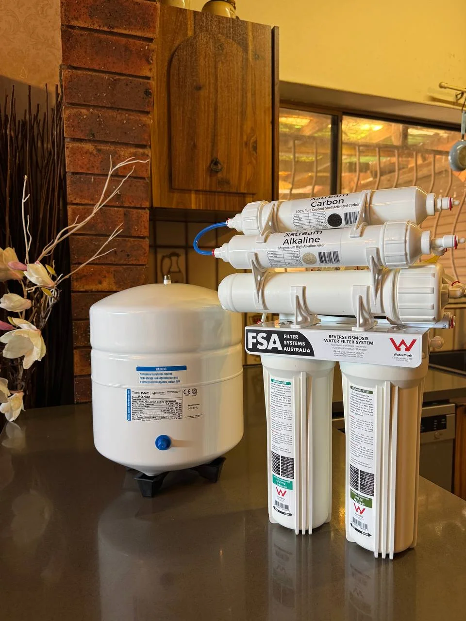 Reverse osmosis water filtration system installed under sink Sydney