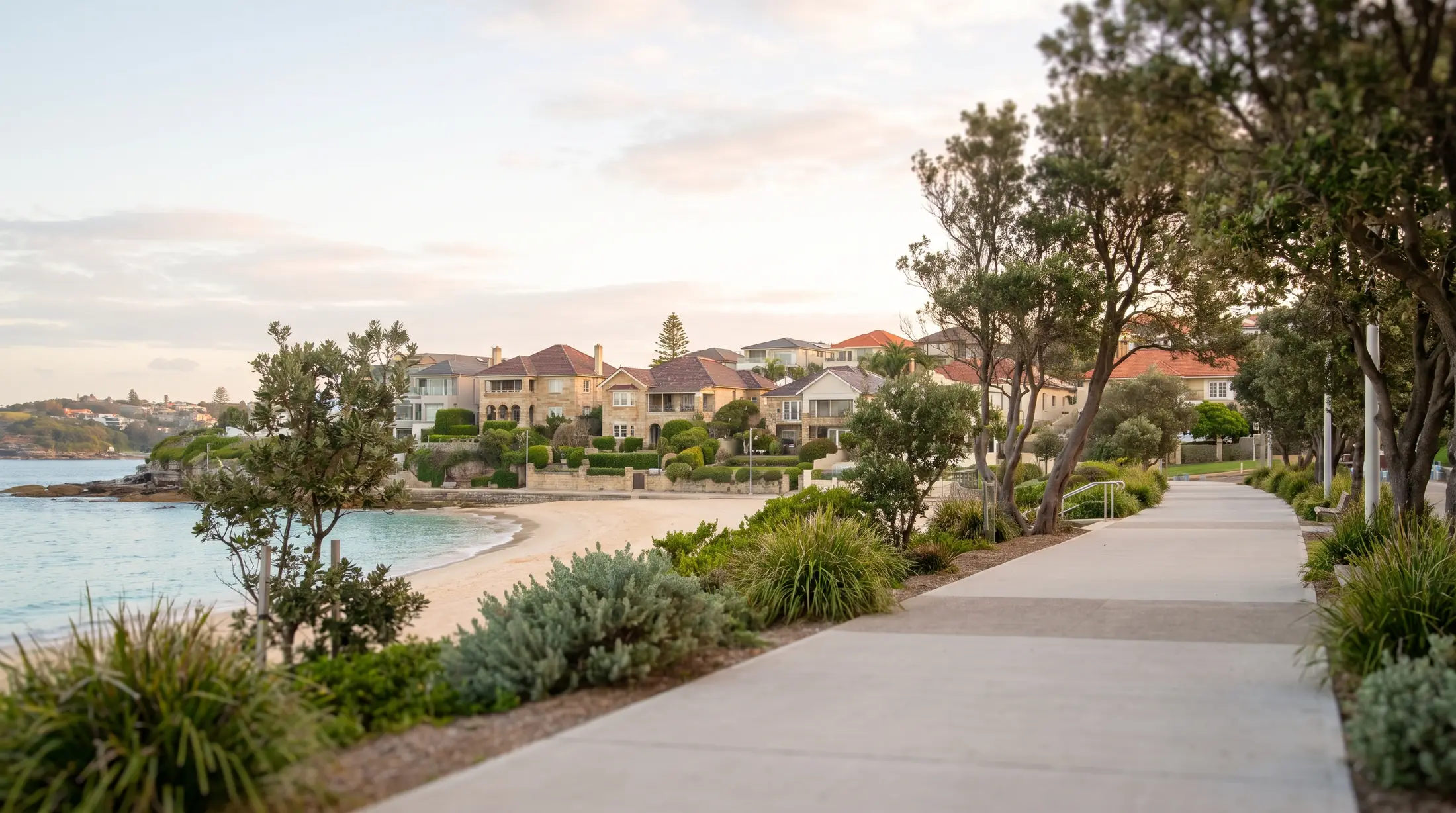 Bondi Beach’s coastal neighbourhood beside the sandy bay and promenade, illustrative residential scene