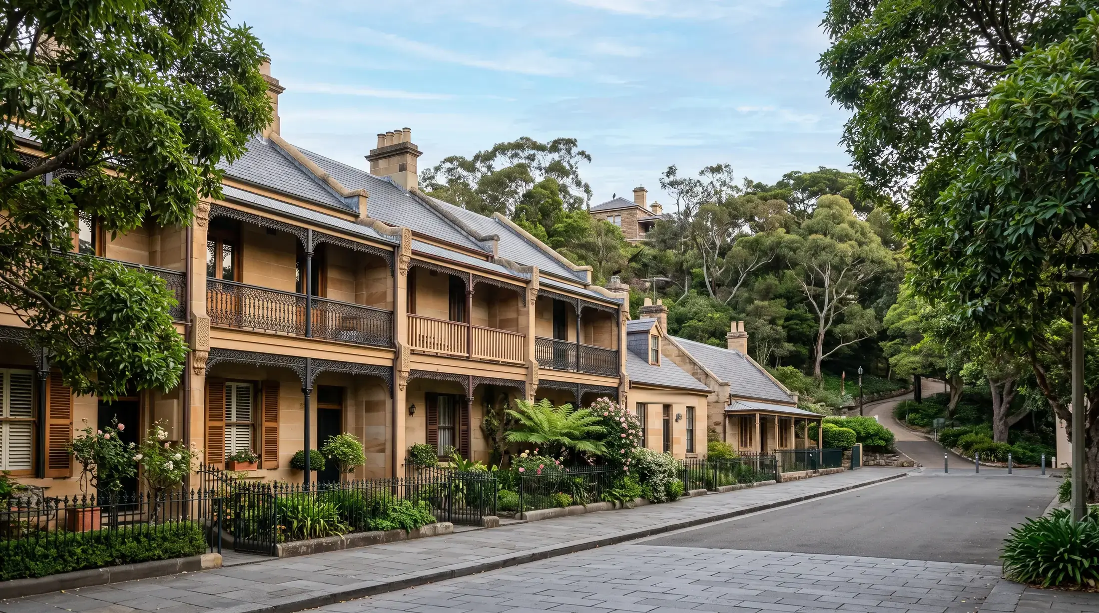 Heritage terrace houses and cottages on a leafy Millers Point street, illustrative residential scene