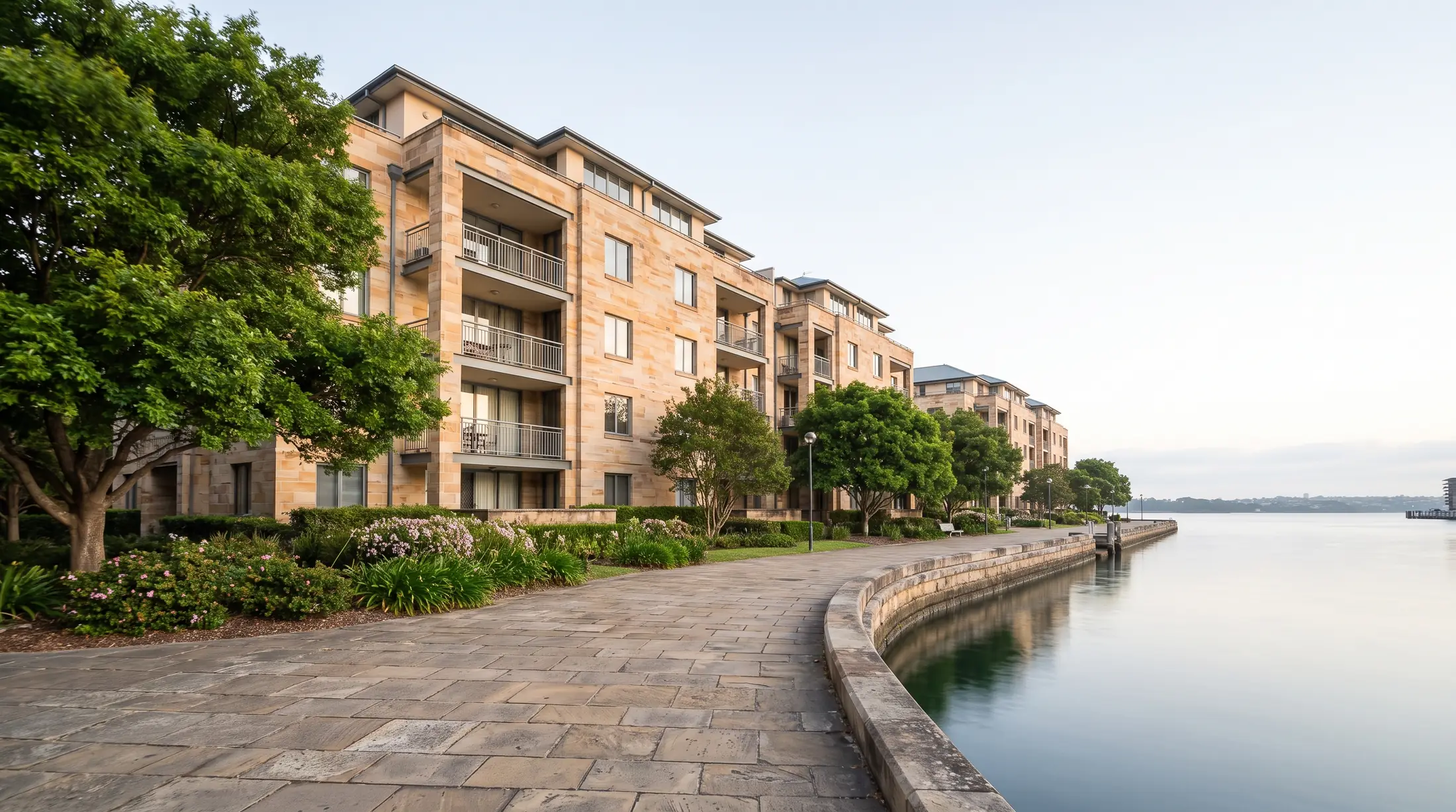 Waterfront apartments and landscaped pedestrian space on the Pyrmont peninsula, illustrative residential scene