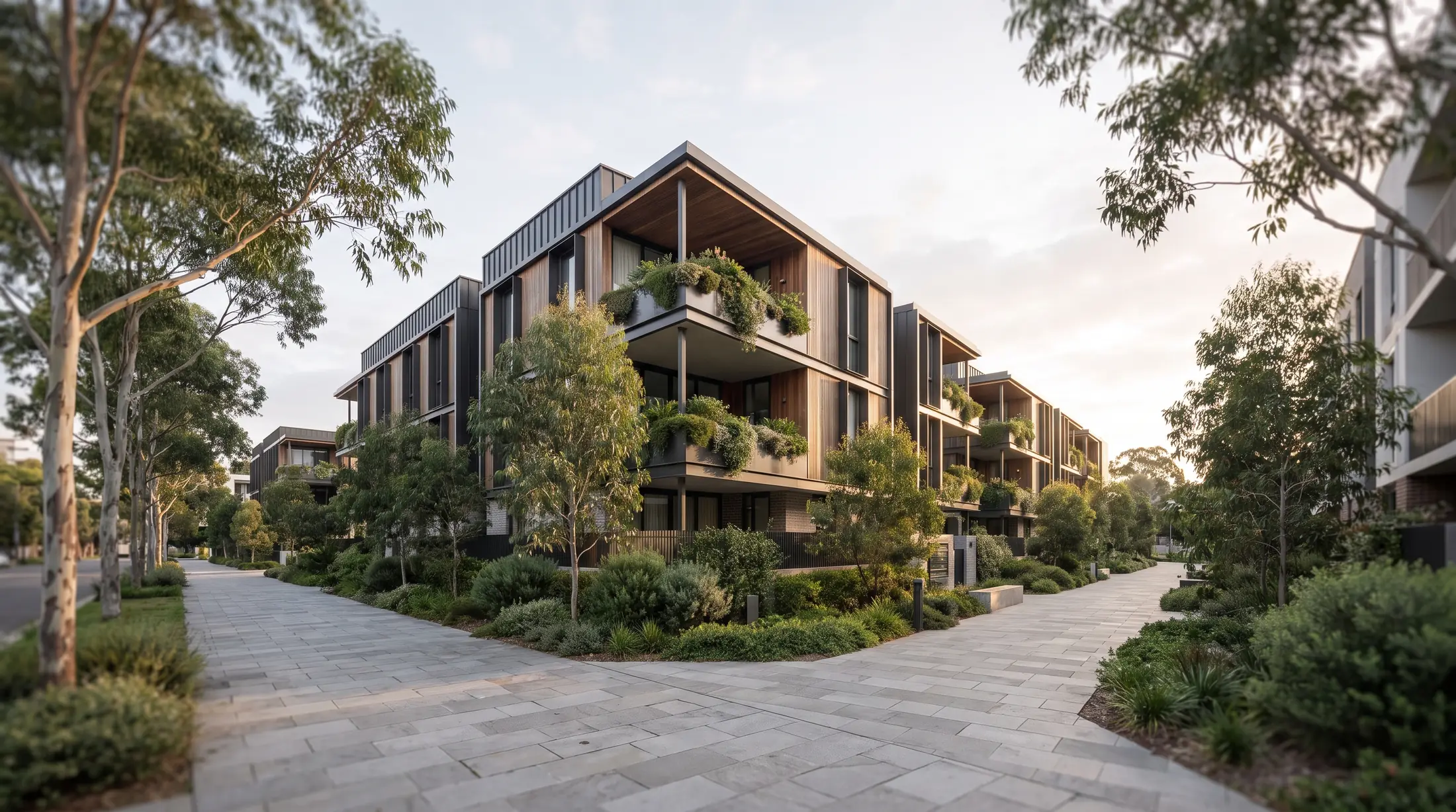 Contemporary Waterloo apartment buildings beside a landscaped footpath, illustrative residential scene