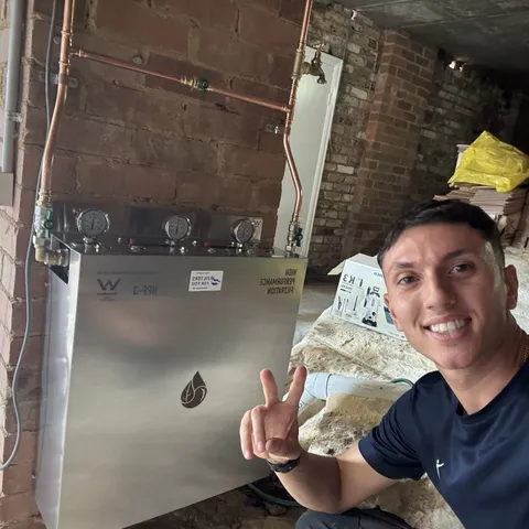 Our installer with a freshly fitted whole house system