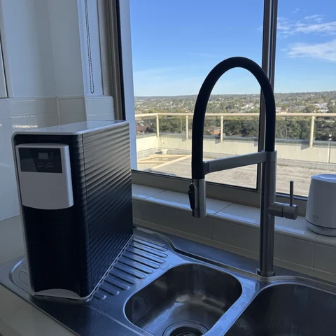 A Pure Luxe smart unit installed inside a kitchen cabinet