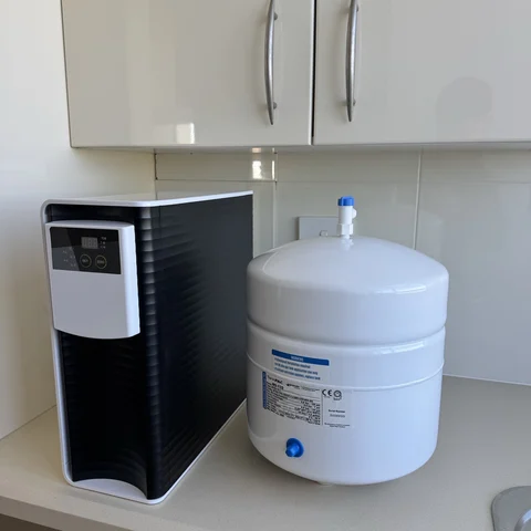 The smart unit and its tank fitted under a Sydney kitchen sink