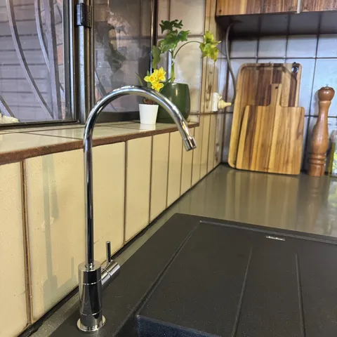 The filtered water tap in a timber kitchen